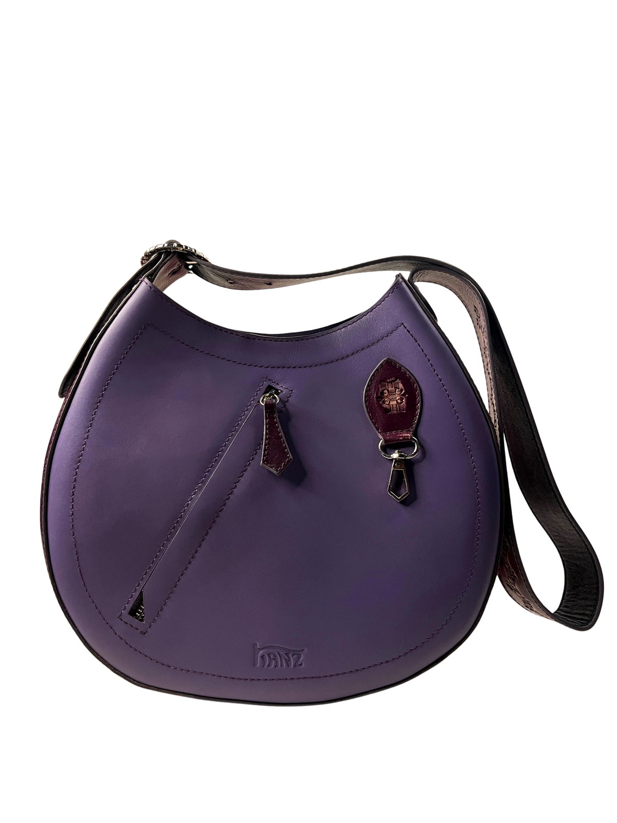 Kanz Arch hand-carved leather crescent bag in violet, front view with the shoulder strap, handmade in Cairo