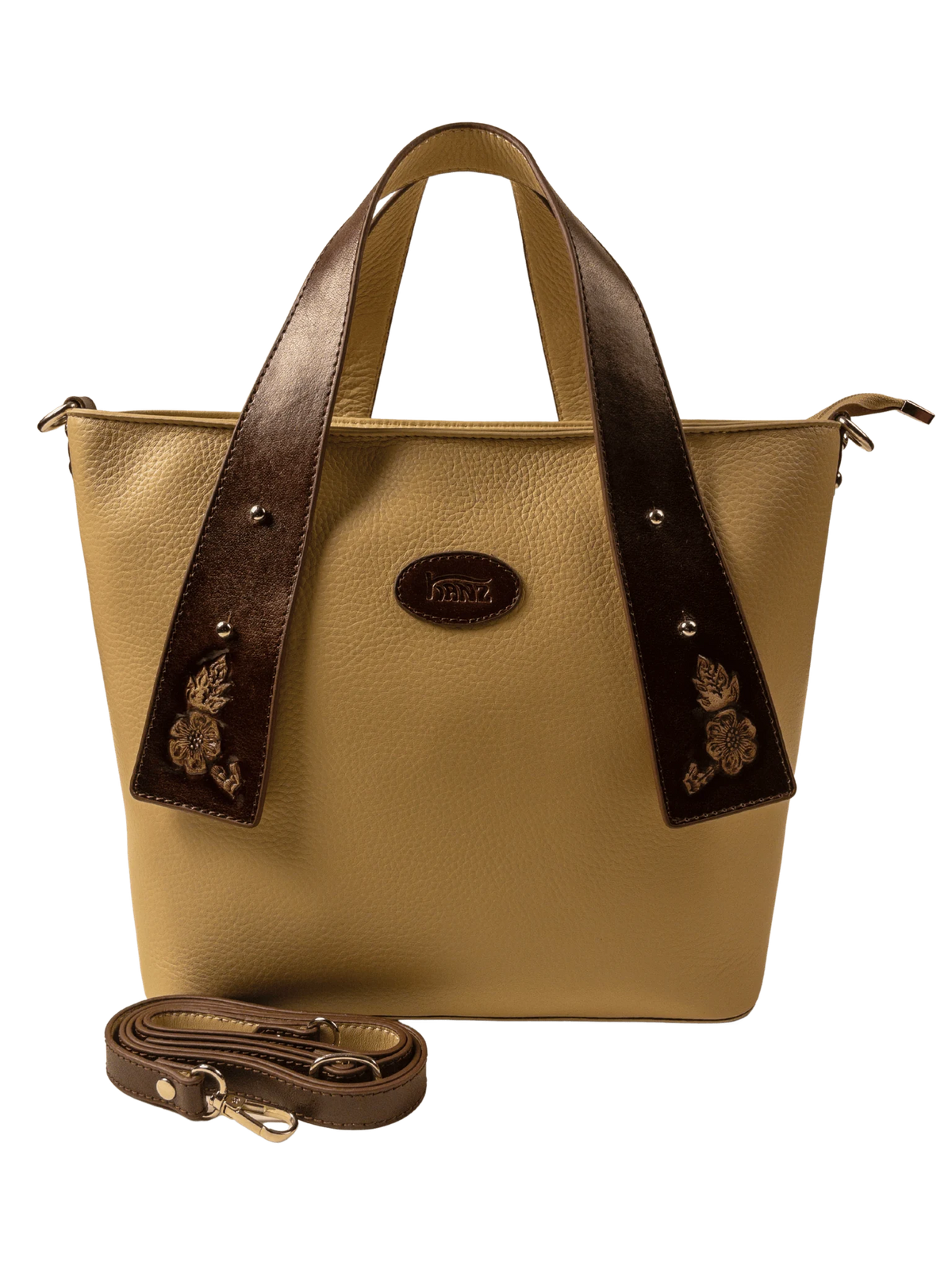 Kanz Wajhan hand-carved leather tote bag in sand with brown trim, front view with the detachable strap, handmade in Cairo