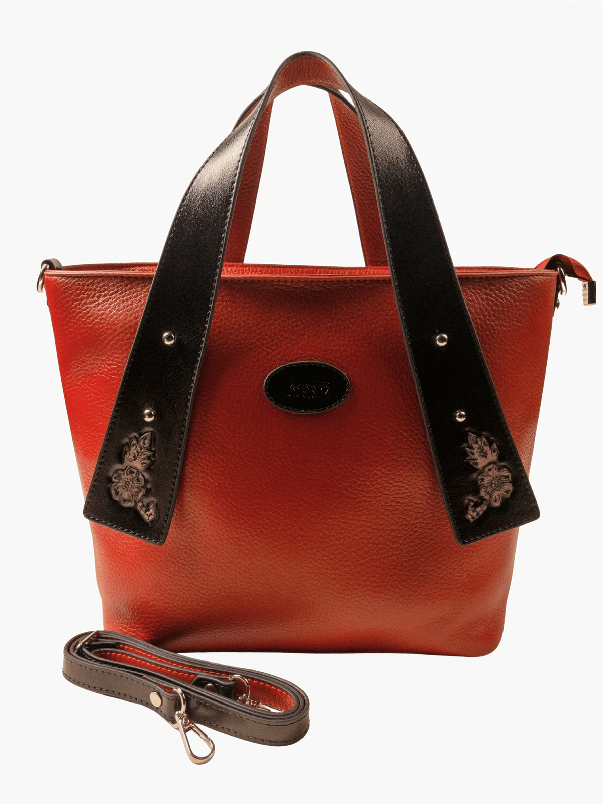 Kanz Wajhan hand-carved leather tote in rumman red with black trim, front view with detachable strap, handmade in Cairo